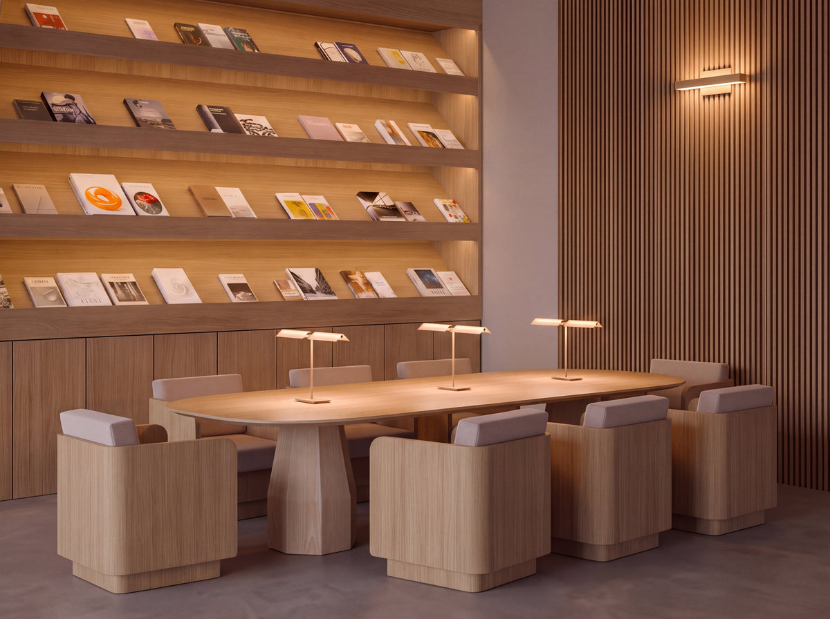 The Long Conversation Table in First Light styled as a meeting table